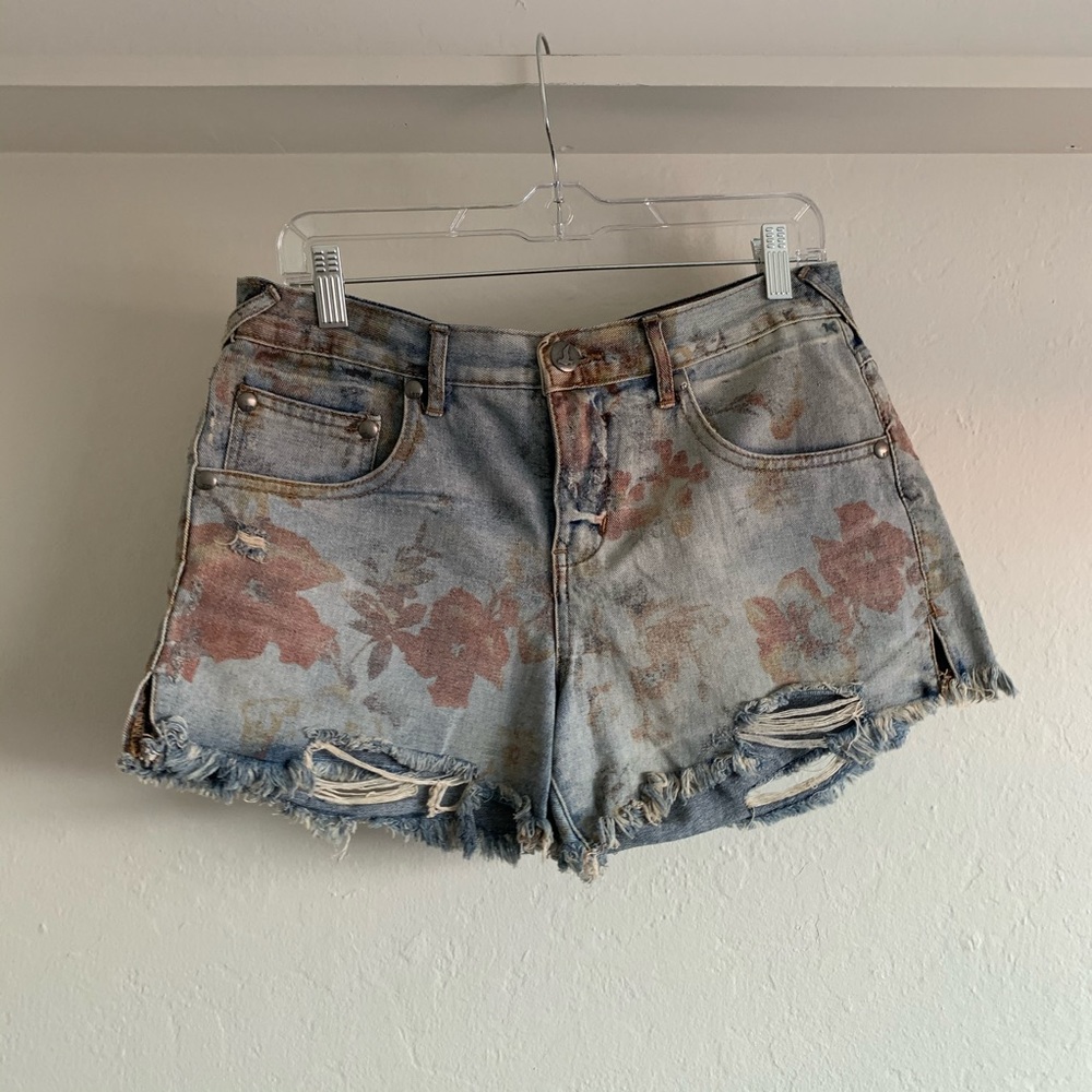 Floral denim cutoff shorts